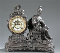 Ansonia Rococo clock w/ seated soldier. c.1900.