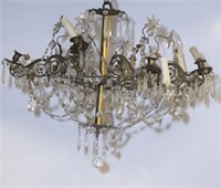 6 arm brass and crystal chandelier. 20th century.