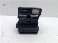 Polaroid One Step Camera  Powered Up