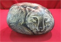 Painted Wolf On Rock