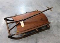 Primitive wooden sled with steel runners