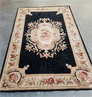 BLACK AND GOLD WOOL RUG 96X60