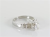 STERLING SILVER MULTI FACETED SOLITAIRE RING