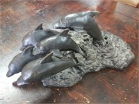 Bronze dolphin sculpture