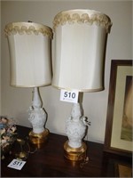 Pair of white bisque cherub table lamps, some