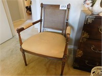 Cane back upholstered arm chair, fancy stitched