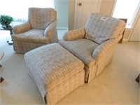 Two Baker Furniture easy chairs and one ottoman,