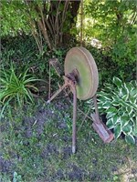 Antique grinder with original seat, the seat is