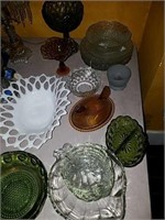 Collection of vintage glassware including hand on