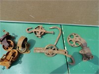 LOT OF STEEL WHEELS AND HOOKS