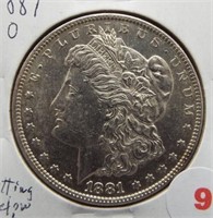 1881-O Morgan Silver Dollar. Pitting Below Date.