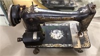 Antique singer sewing machine with some wear to