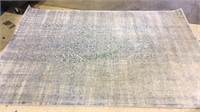 Blue and white rug made in Turkey, measures 5 ft