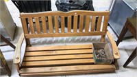 Porch swing made of wood 48 inches wide has some
