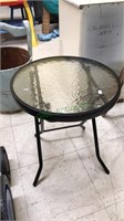 Glass top patio table, 18 x 16" in diameter,