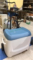 Heavy duty igloo cooler with a large wheels and a