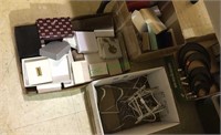 Two boxes of jewelry boxes and a box of plate