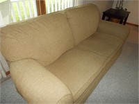 Nice clean reclining sofa, 82 inches long.