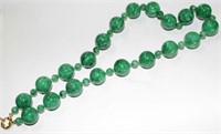 Strand of very large jade beads,