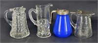 Group Of Syrup Pitchers