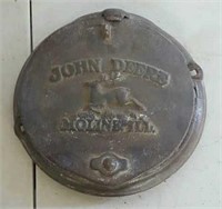 John Deere cast iron planter cover