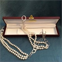 SIX STRAND FRESHWATER CHINESE PEARL NECKLACE.
