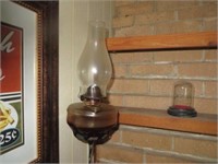 OLD OIL LAMP AND CAST IRON STAND