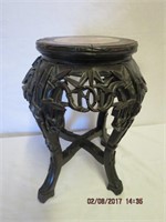 Carved oriental stand with marble insert 18'H