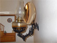 Hanging coal oil lamp, with reflector.