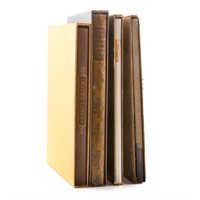 Four slip cased collector's books