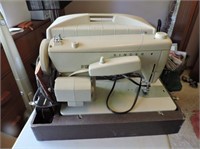 Singer portable sewing machine with foot control