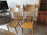 Four very nice antique press back chairs