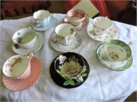 Fancy cups and saucers total eight