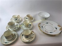 PARTIAL TEA SERVICE FLORAL WITH WHITE FIELD