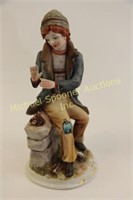 CAPODIMONTE FIGURINE - YOUNG BOY BESIDE FIRE