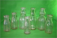 7 Assorted Milk Bottles