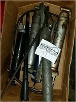 Box of Grease Guns