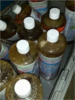 Pallet of cleaning supplies, oil, and solvents