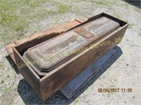 Steel coffin burial vault in wood crate