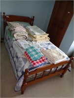 Maple Twin Bed with Blue & White Quilt and