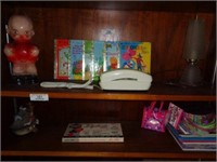 Contents of Book Shelf i.e.  Chalk Doll Figure,