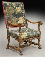 Louis XIII style carved walnut arm chair with