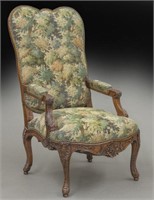 French carved walnut upholstered arm chair