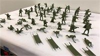 Lot of 56 United States Toy Soldiers and cots