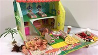 Vintage doll house Cape Cod style with dolls and