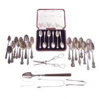 Collection of sterling spoons & sugar tongs