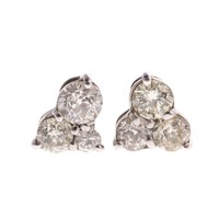 A Pair of Lady's Diamond Earrings in Gold
