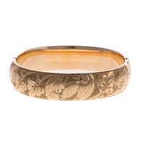 A Wide Floral Bangle Bracelet in Gold