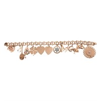 A Lady's Gold Link Bracelet with 15 Charms