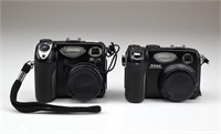 Two Nikon Cameras and Accessories